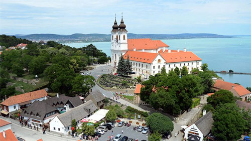 Wander around the historic streets of Tihany and admire the citys impressive landmarks and sights. Enjoy an optional visit to the 1000-year old Benedictine monastery, the Tihany Abbey, and learn more about its rich religious history.